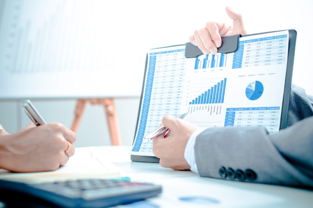 Business,People,Discussing,The,Charts,And,Graphs,Showing,The,Results