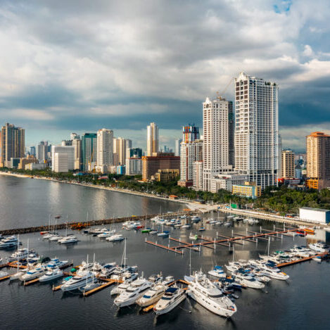 Cityscape of Manila. It is the capital of the Philippines, is a densely populated bayside city on the island of Luzon